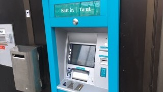 En blå uttagningsautomat